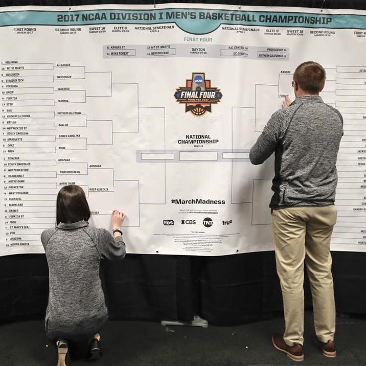 NCAA presents options to expand March Madness tournaments from current 68 teams, AP source says